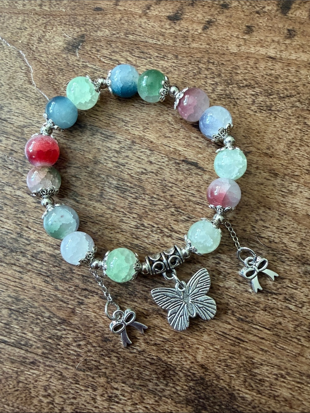 Multicolor Bead Bracelet with Butterfly and Bow Charms